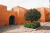 (c) Copyright - Raphael Kessler 2011 - Peru - Arequipa - Santa Catalina Convent - Red arches and tree