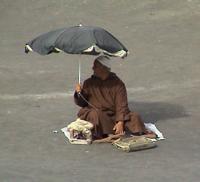 © Copyright Raphael Kessler - Morocco - Brolly Man