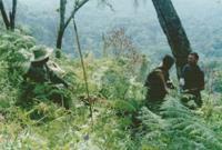© Copyright - Raphael Kessler 2011 - Uganda - Bwindi Impenetrable Forest - High level meeting - President Museveni, Anna from the BBC and me.