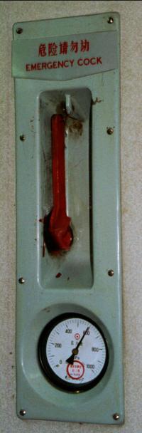 © Copyright - Raphael Kessler 2011 - China - An Emergency Cock handle as found on a train. No idea what the pressure gauge is about