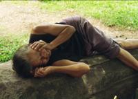 © Copyright - Raphael Kessler 2011 - Laos - Old lady at Wat Phou getting her beauty sleep