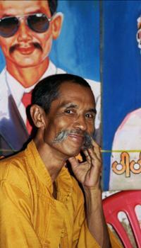 © Copyright - Raphael Kessler 2011 - Myanmar - Moustache Lu Maw political activist entertainer