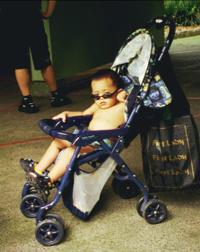 © Copyright - Raphael Kessler 2011 - Singapore - Cool kid in shades and pram