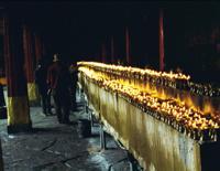 © Copyright - Raphael Kessler 2011 - Tibet - Samye - Butter candles and Tibetans