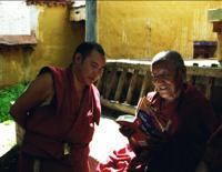 © Copyright Raphael Kessler - Tibet - Checking The Guidebook
