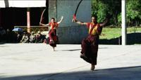 © Copyright - Raphael Kessler 2011 - Tibet - Shigatse - Dancing monks with swords
