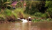 © Copyright - Raphael Kessler 2011 - Vietnam - Mekong Delta doing the laundry in the river