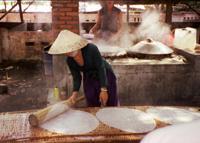 © Copyright - Raphael Kessler 2011 - Vietnam - Making rice noodles the traditional way - they do look like pancakes at this stage