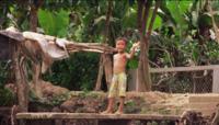 © Copyright - Raphael Kessler 2011 - Vietnam - Mekong Delta young boy waving at the side of the river
