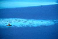 © Copyright - Raphael Kessler 2011 - French Polynesia - Bora Bora - Hut in the middle of the blue