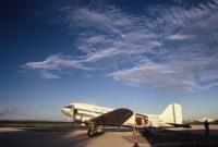 © Copyright - Raphael Kessler 2011 - Tonga - Nuku 'alofa - DC3 on the tarmac - Dragon in the sky