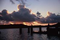 © Copyright - Raphael Kessler 2011 - Tonga - Vava'u - Boys diving from the pier at sunset