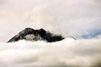 © Copyright - Raphael Kessler 2011 - Ecuador - Banos - Tungarahua volcano smoking in the clouds
