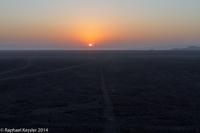 © Copyright - Raphael Kessler 2014 - Peru - Nasca - sun dissapearing over lines