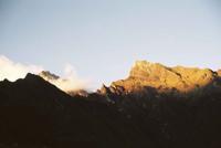 © Copyright Raphael Kessler - Peru - Choquekirao Sun On Mountain