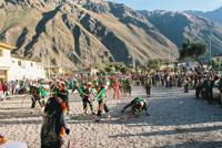 © Copyright - Raphael Kessler 2011 - Peru - Ollantaytambo - Person getting whipped falls over