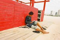 © Copyright Raphael Kessler 2011 - Uruguay - Punte del Este - Esther dusted with sand