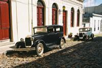 © Copyright Raphael Kessler 2011 - Uruguay - Colonia - Model Ts on the street