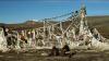 (c) Copyright - Raphael Kessler 2011 - Tibet - Taking a break amongst the prayer flags