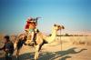 (c) Copyright - Raphael Kessler 2011 - Israel - Me on a camel with an M-16