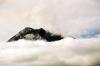 (c) Copyright - Raphael Kessler 2011 - Ecuador - Banos - Tungarahua volcano smoking in the clouds