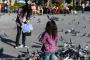 (c) Copyright - Raphael Kessler 2014 - Peru - Arequipa Plaza de Armas - Pigeon on head