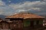 (c) Copyright - Raphael Kessler 2014 - Peru - Train view - house with bulls
